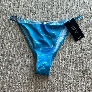 NA-KD pool print thin strap bikini bottom